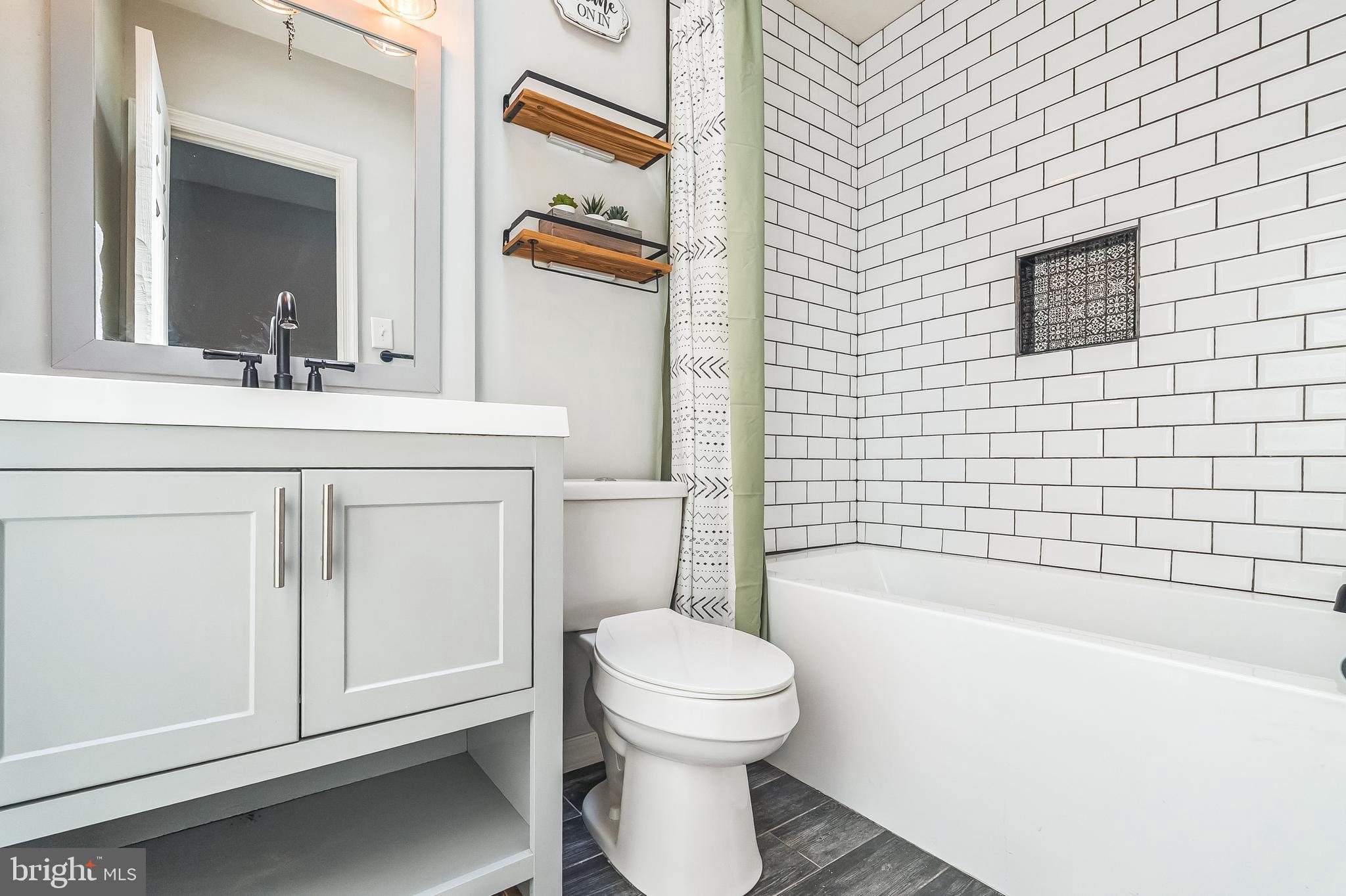 7448 Hill Road Philadelphia, PA 19128 - Photo 29 of 42 Renovated Hall Bathroom with Tub