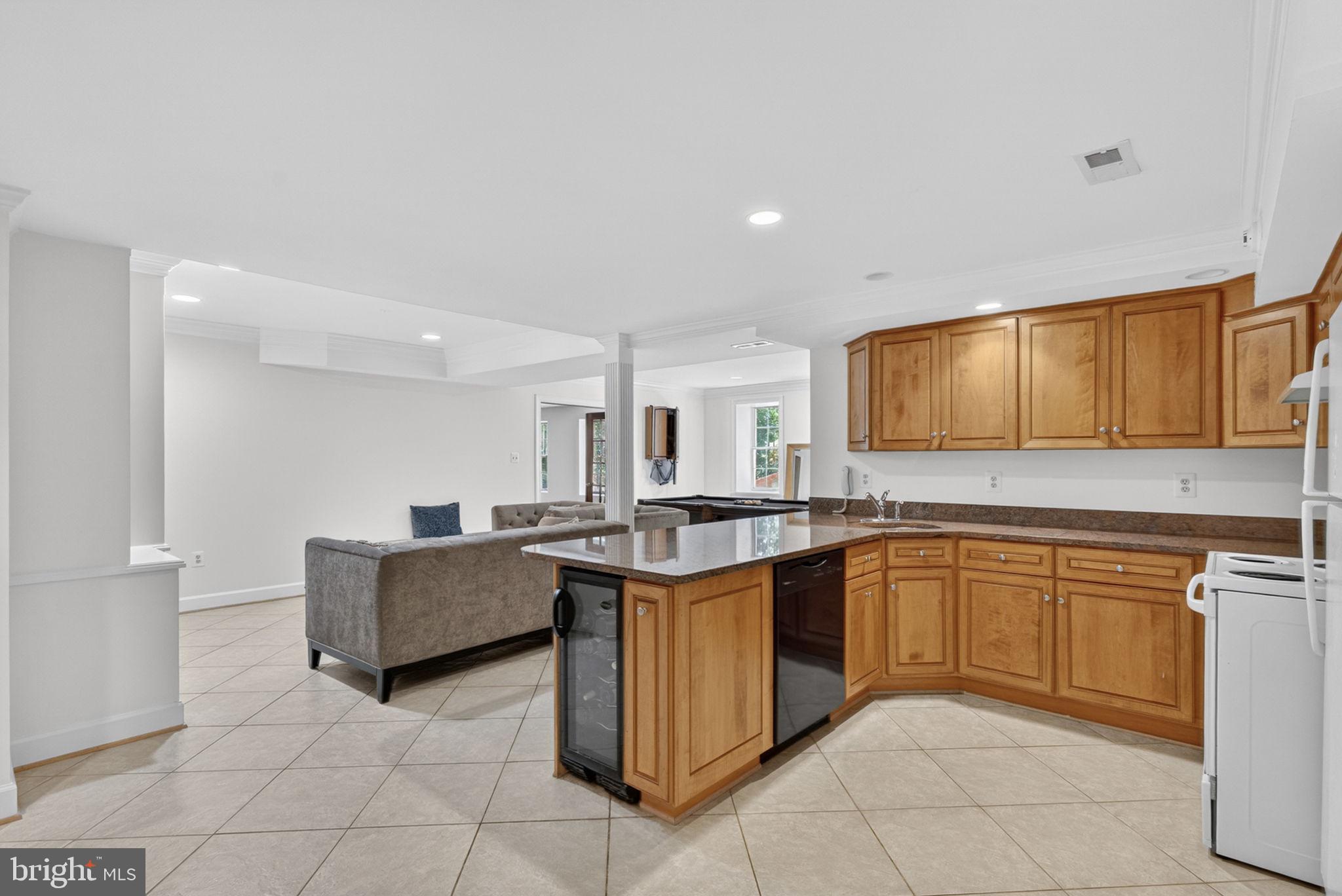 4531 Den Haag Road Warrenton, VA 20187 - Photo 63 of 103 a kitchen with stainless steel appliances granite countertop a sink and cabinets