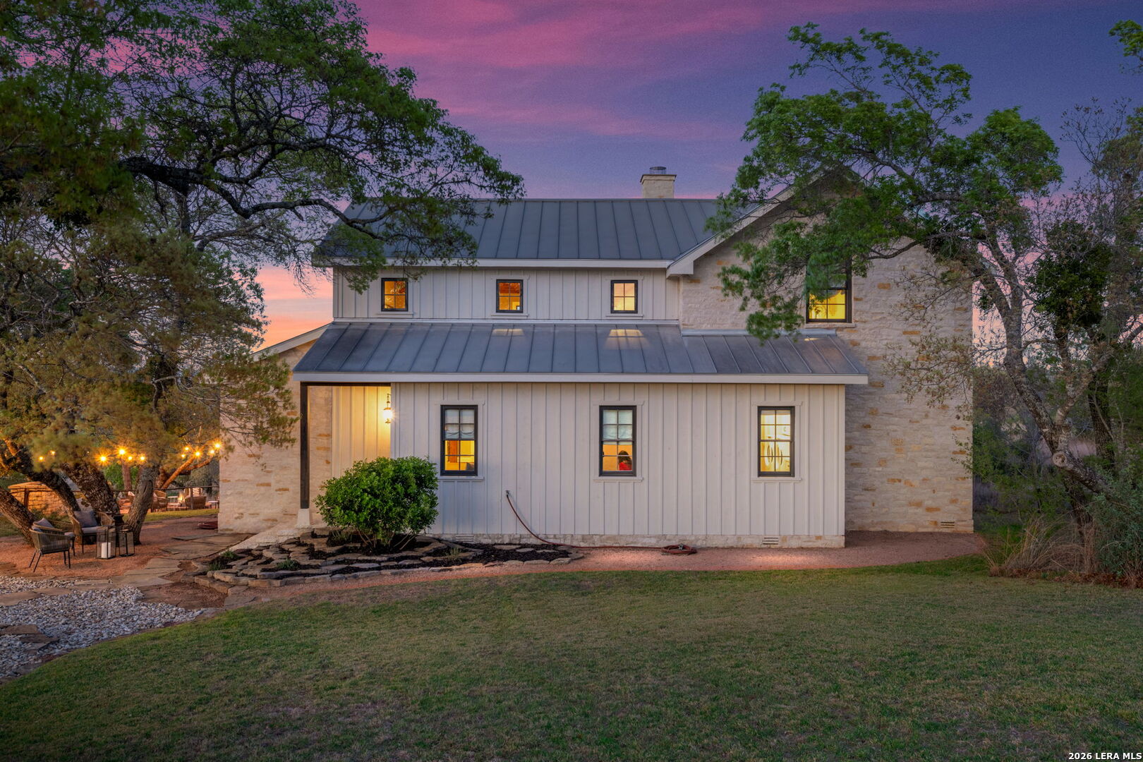 1429 Kendall Jackson Comfort, TX 78013 - Photo 12 of 88 a front view of house with yard and trees in the background