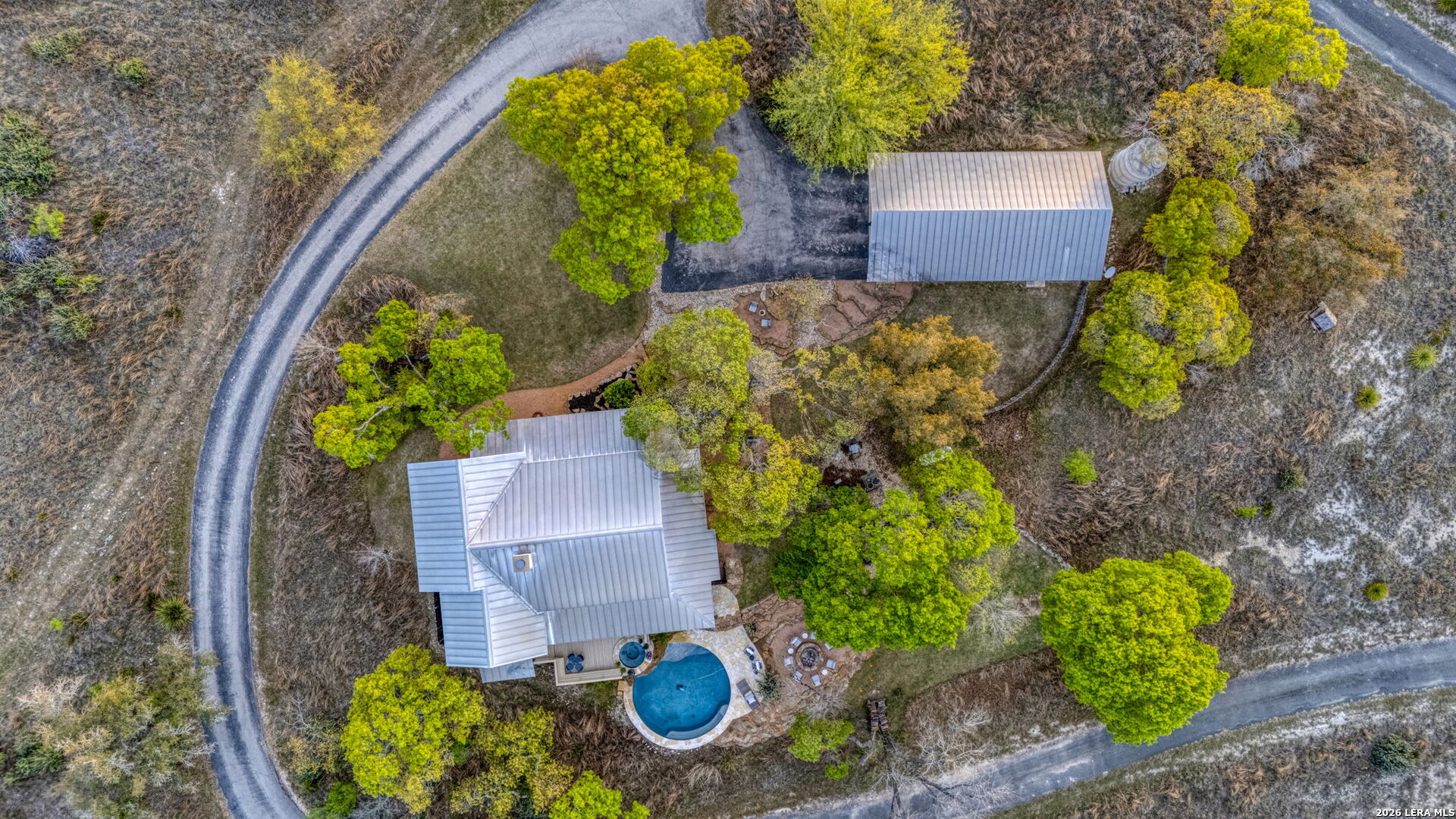 1429 Kendall Jackson Comfort, TX 78013 - Photo 78 of 88 an aerial view of a house with a yard and garden