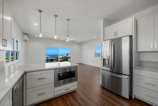 a bathroom with a toilet a sink and bathtub