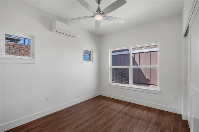 a bathroom with a bathtub and a toilet