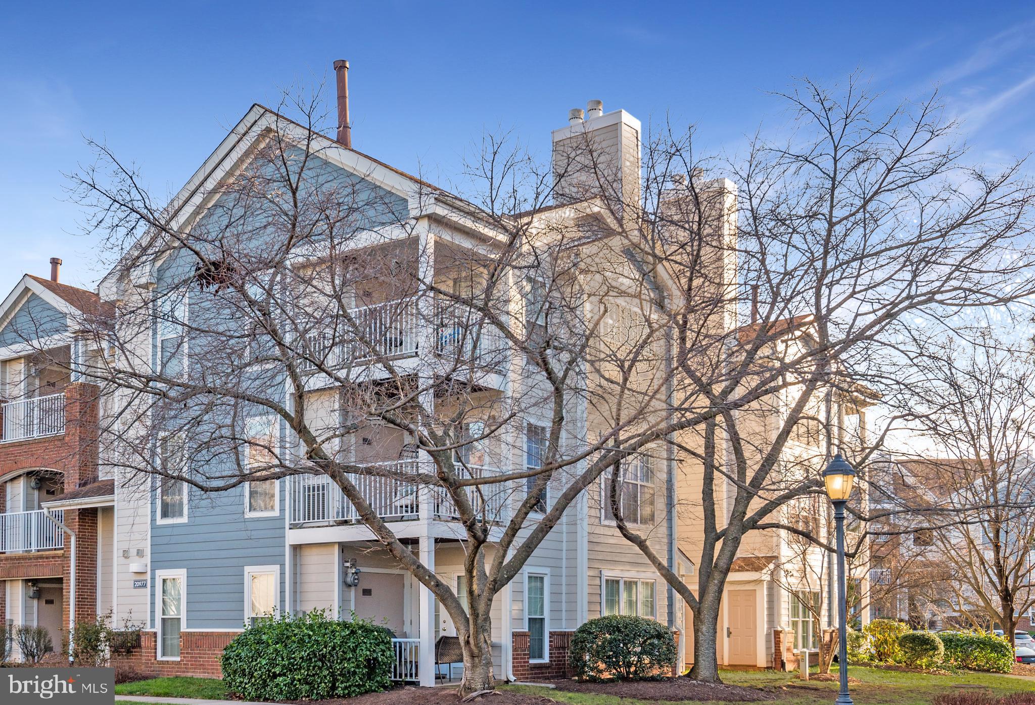 20977 Timber Ridge Terrace, Unit 104 Ashburn, VA 20147 - Photo 1 of 23 Side Building