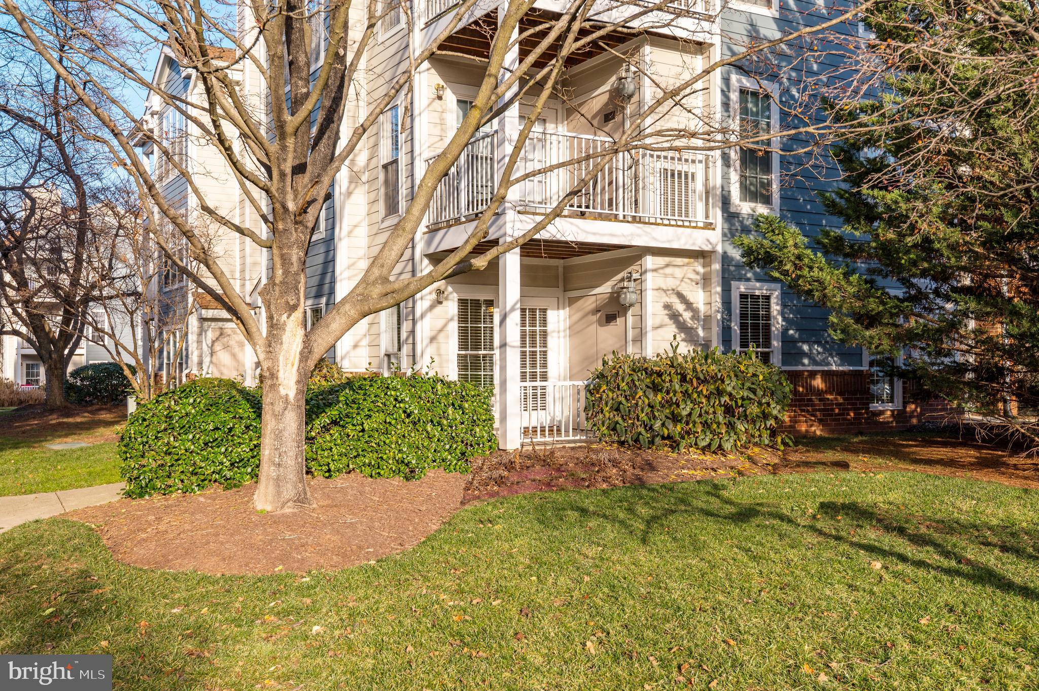 20977 Timber Ridge Terrace, Unit 104 Ashburn, VA 20147 - Photo 3 of 23 Private Terrace Level Patio