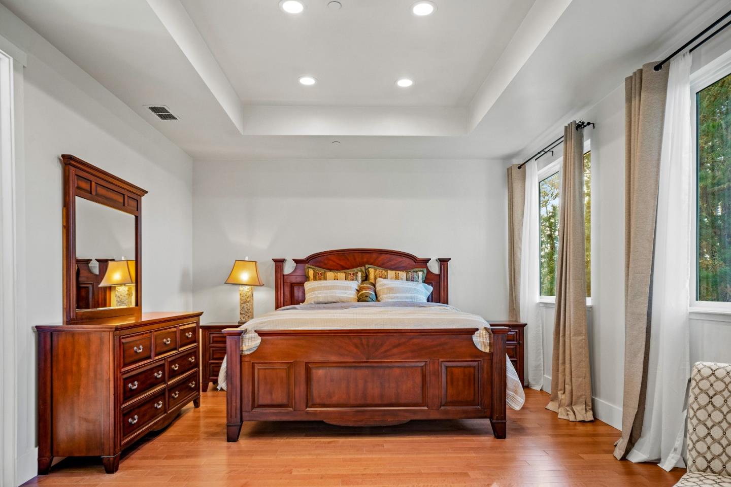 4044 Sunset Lane Pebble Beach, CA 93953 - Photo 30 of 39 a living room with furniture and a flat screen tv