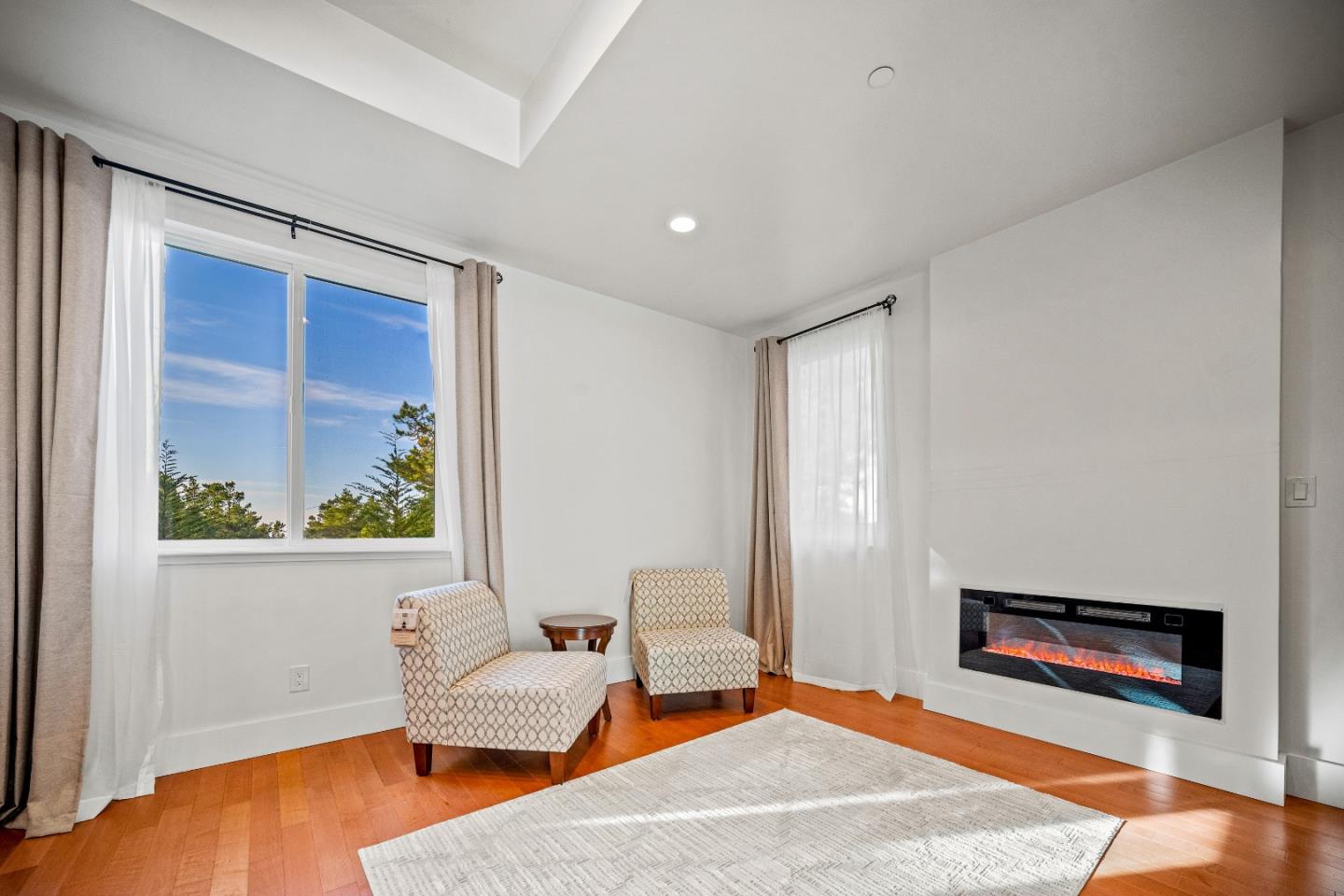 4044 Sunset Lane Pebble Beach, CA 93953 - Photo 31 of 39 a bedroom with furniture and a window