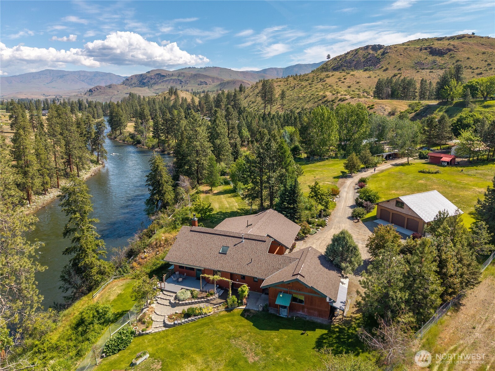 2621 Highway 153 Twisp, WA 98856 - Photo 2 of 40 an aerial view of residential houses with outdoor space