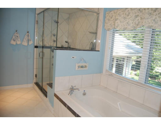 6 Brookwood Road Lexington, MA 02420 - Photo 18 of 27 a bathroom with a bathtub and a shower