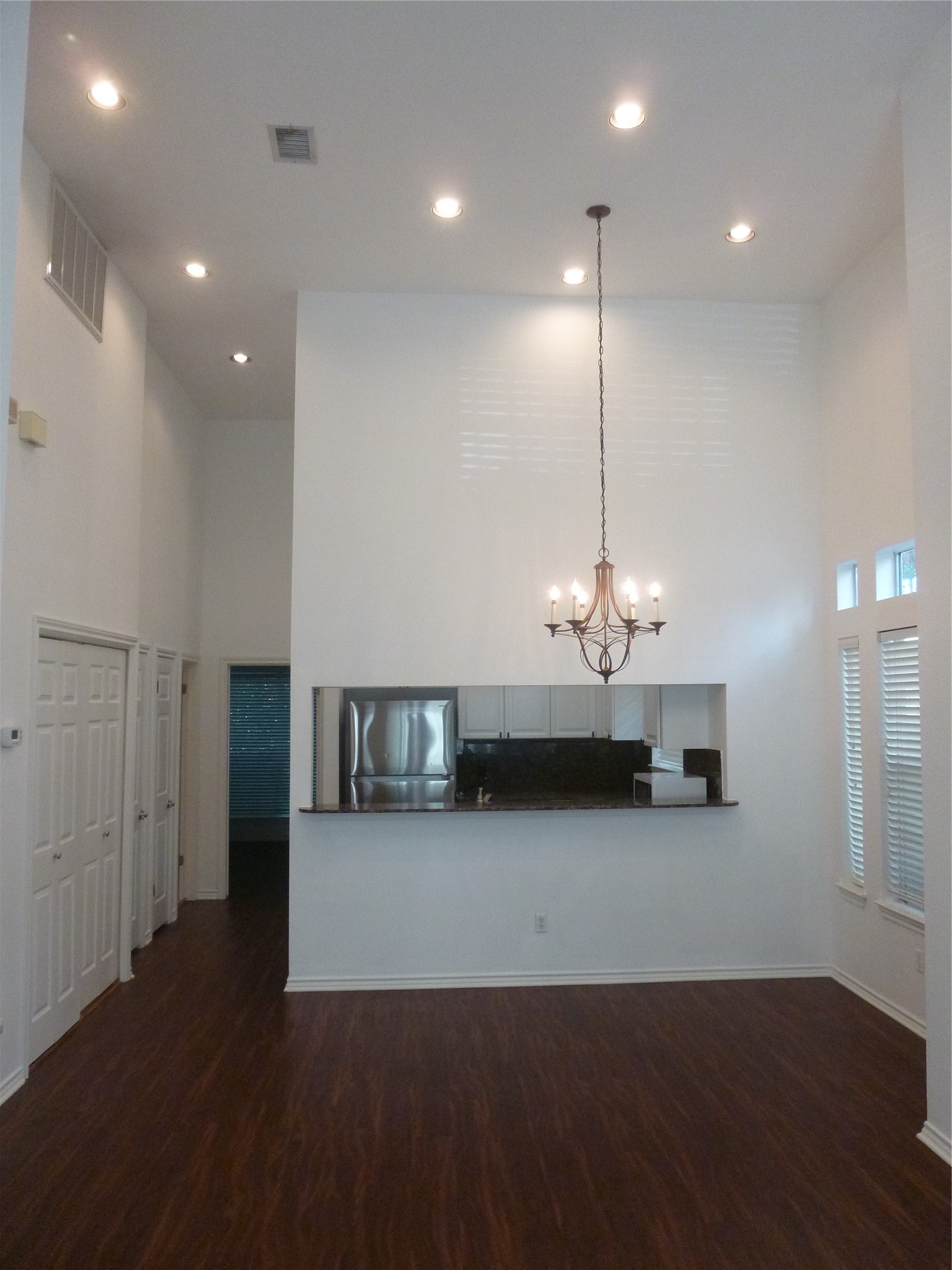 2918 Ranch Road 620 North, Unit Y194 Austin, TX 78734 - Photo 11 of 35 a view of a room with wooden floor fire place and windows