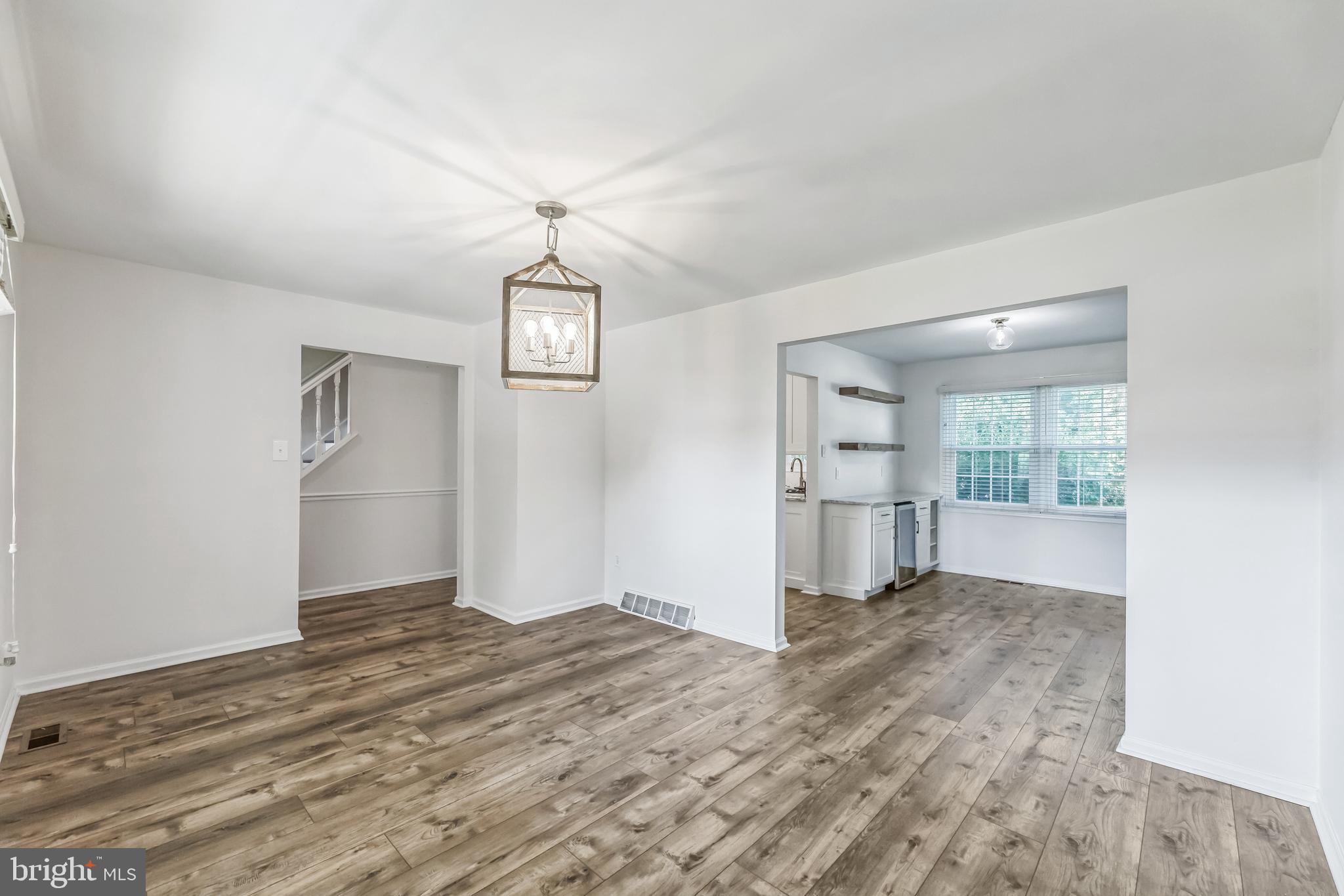 23 New Oak Road Mickleton, NJ 08056 - Photo 11 of 30 a view of a big room with wooden floor and windows