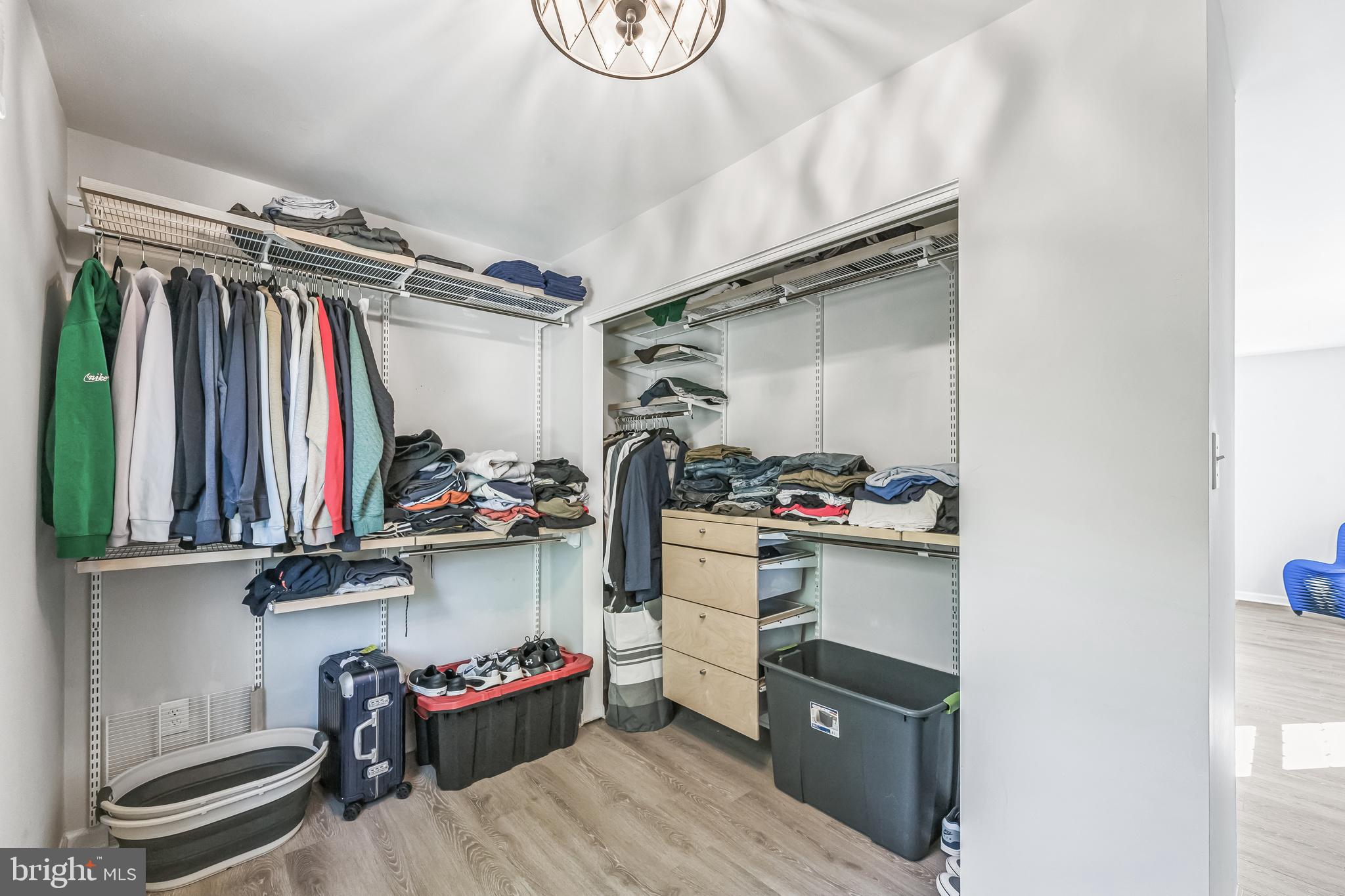 23 New Oak Road Mickleton, NJ 08056 - Photo 17 of 30 a view of walk in closet with clothes and shoes