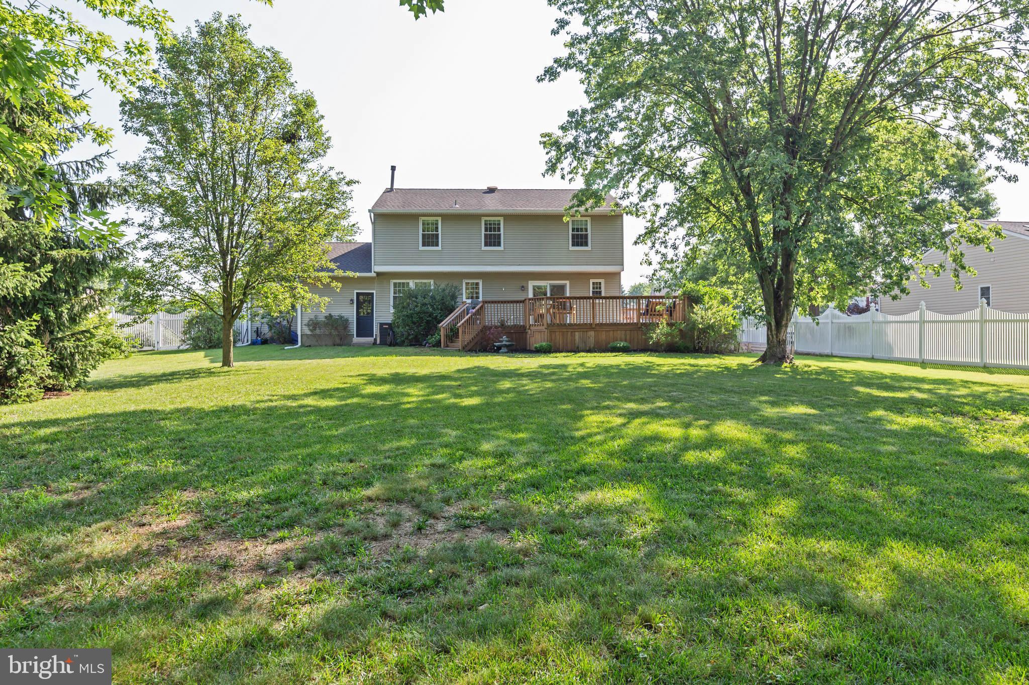 23 New Oak Road Mickleton, NJ 08056 - Photo 29 of 30 a view of a house next to a big yard and large trees