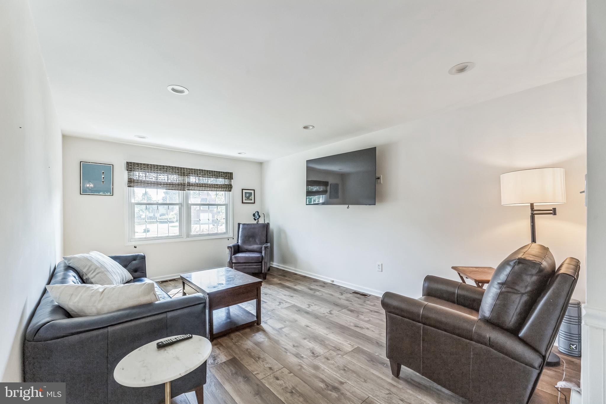 23 New Oak Road Mickleton, NJ 08056 - Photo 7 of 30 a living room with furniture and a flat screen tv
