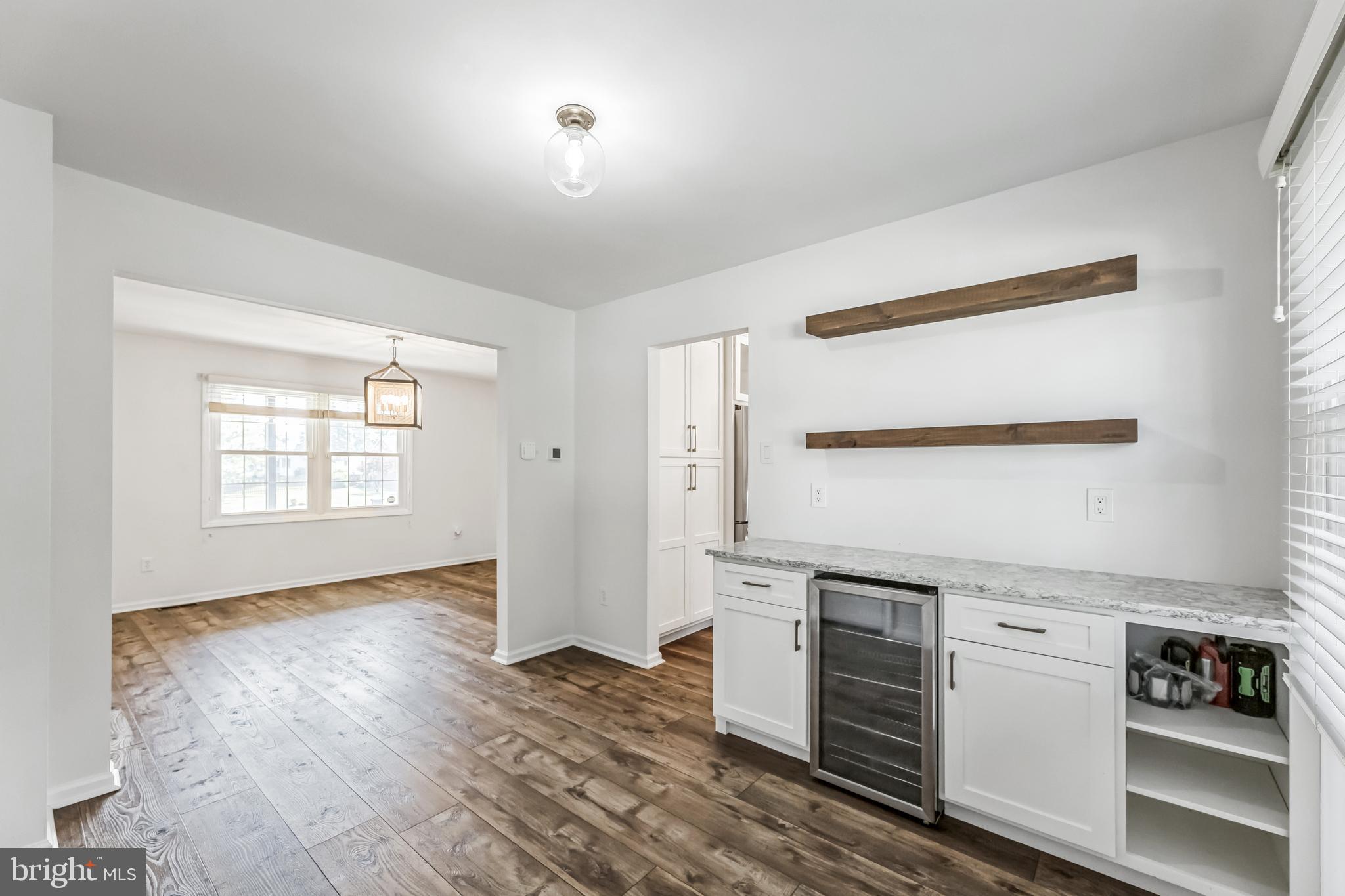 23 New Oak Road Mickleton, NJ 08056 - Photo 9 of 30 a kitchen with white cabinets and white appliances