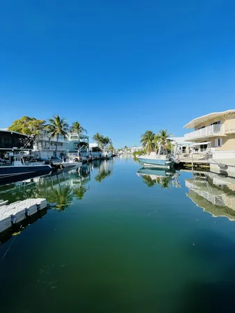 a view of a lake with couches