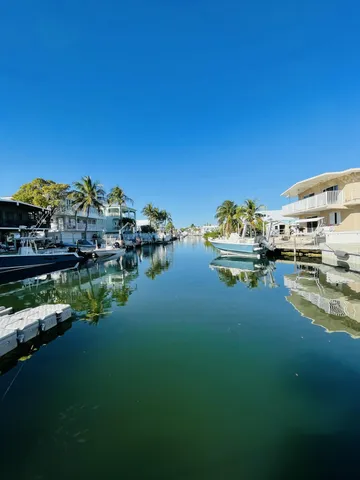 a view of a lake with couches
