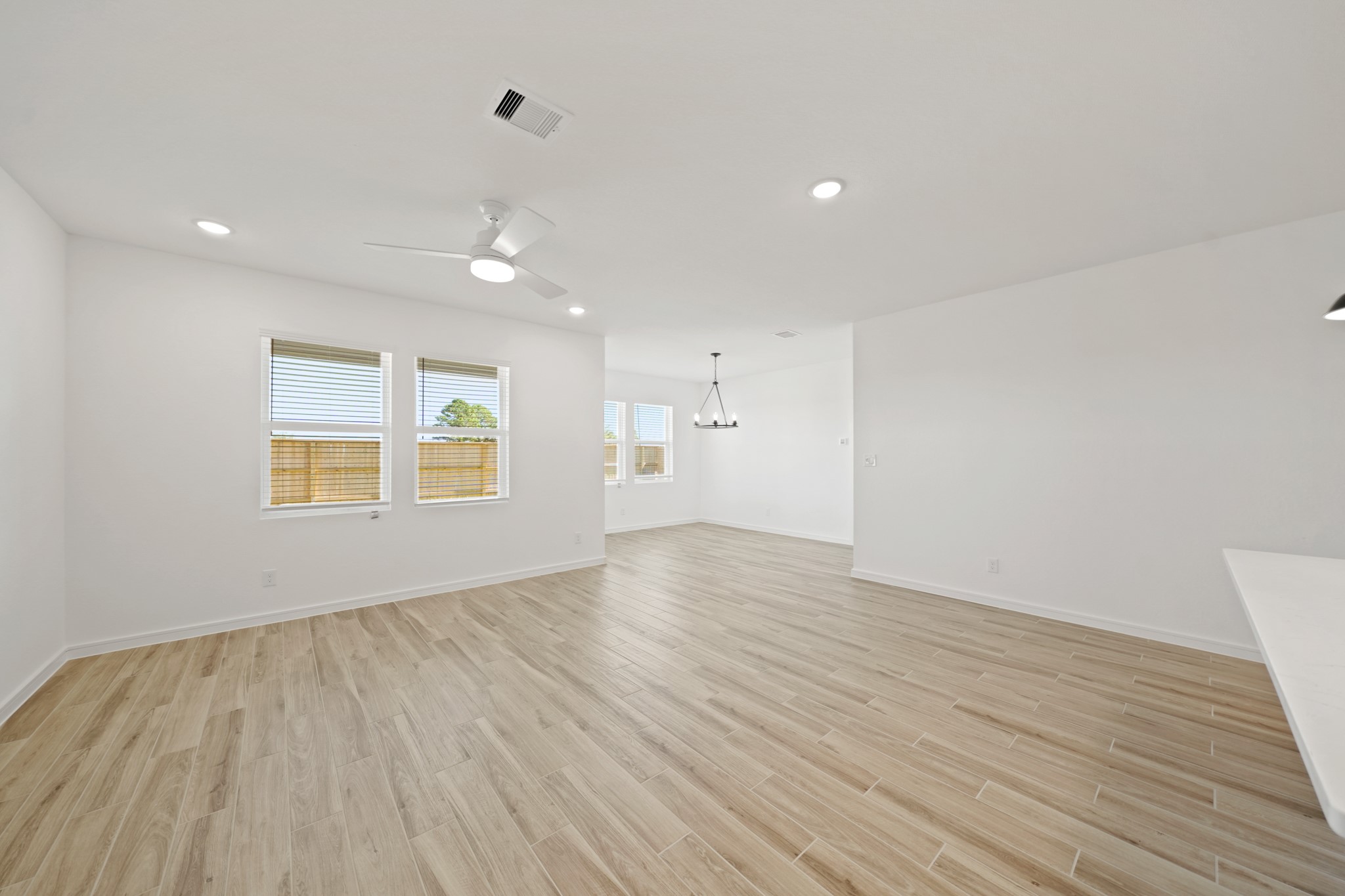 7922 Jasper Mdws Way Angleton, TX 77515 - Photo 7 of 31 Open great room (*Photo not of actual home and used for illustration purposes only.)