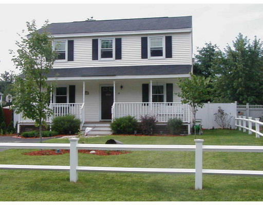 25 Springwell Road Billerica, MA 01821 - Photo 1 of 7 a front view of a house with a yard