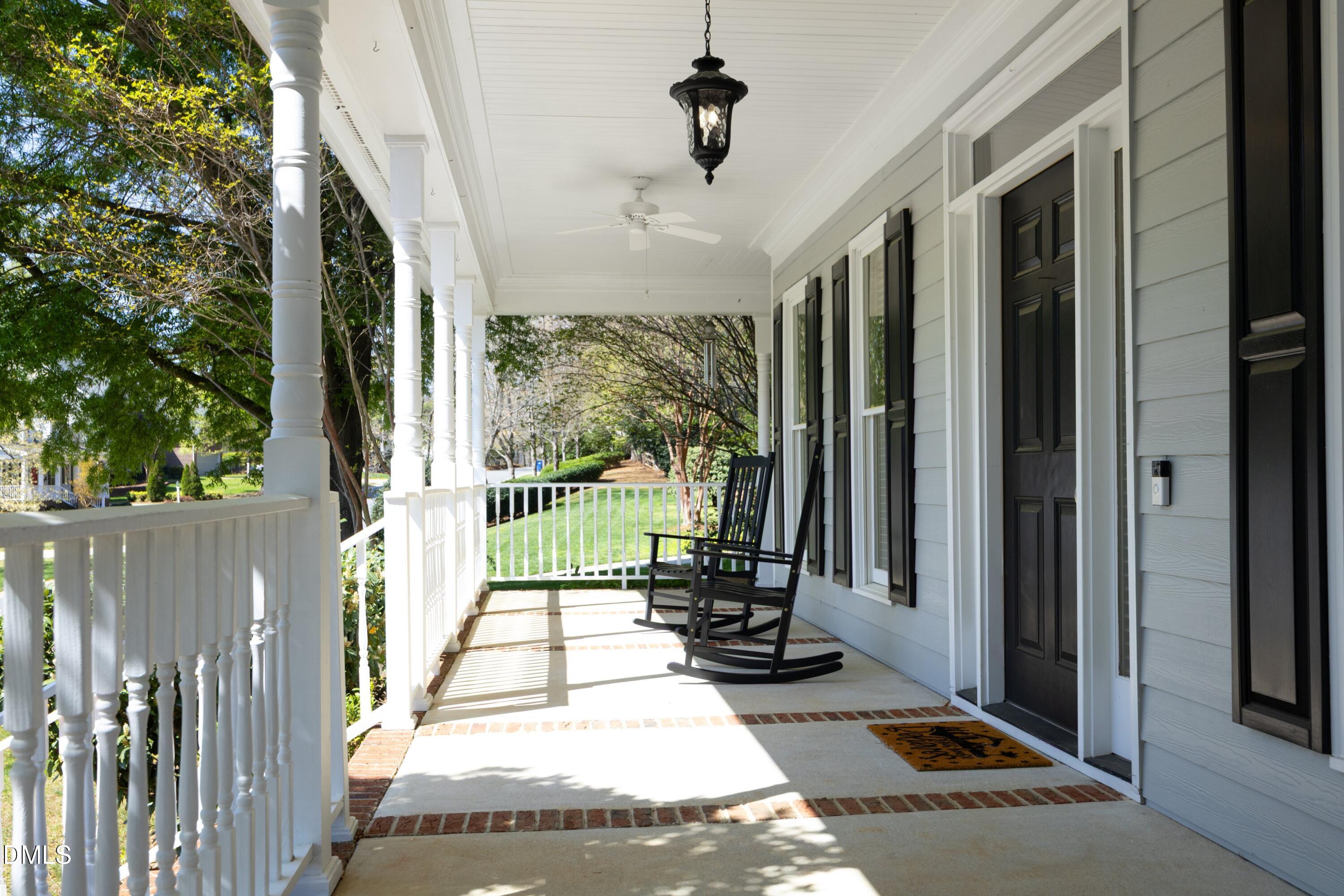 1427 Moosecreek Drive Raleigh, NC 27614 - Photo 5 of 51 a view of a balcony with wooden floor