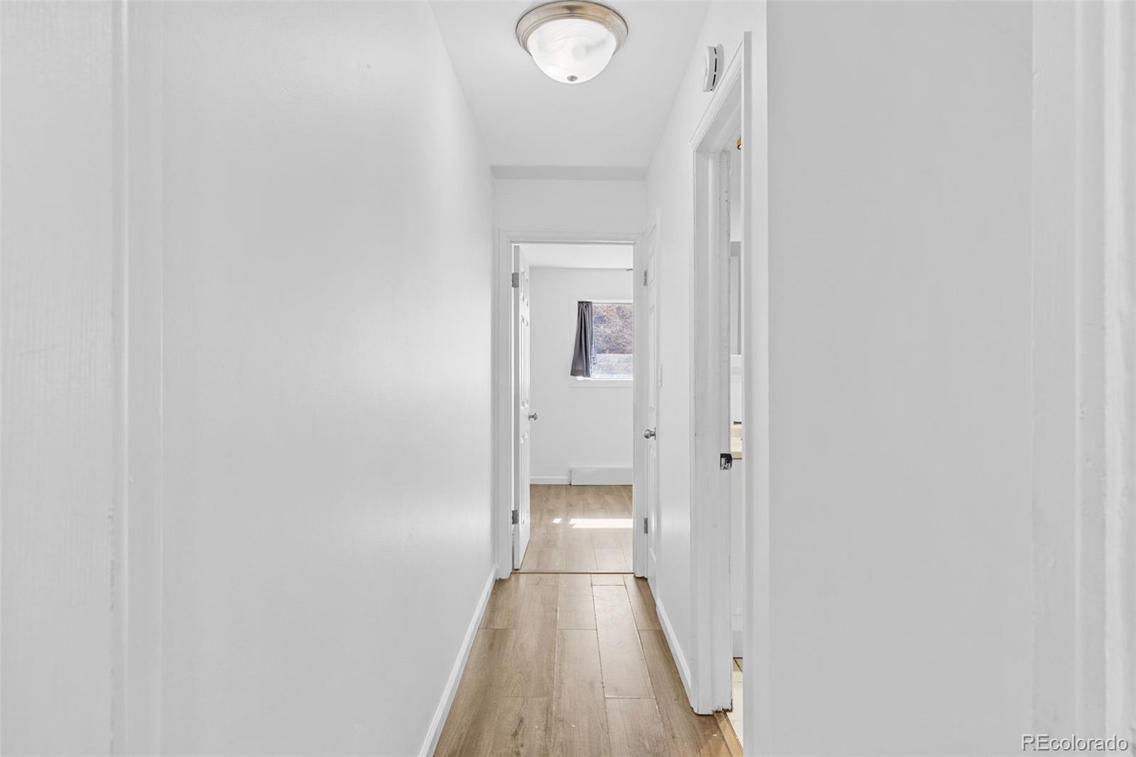 1630 Chester Street Aurora, CO 80010 - Photo 20 of 31 a view of a hallway