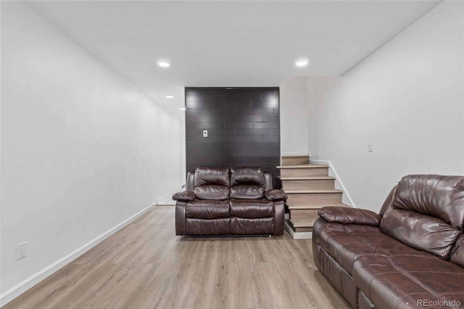 1630 Chester Street Aurora, CO 80010 - Photo 10 of 31 a living room with furniture