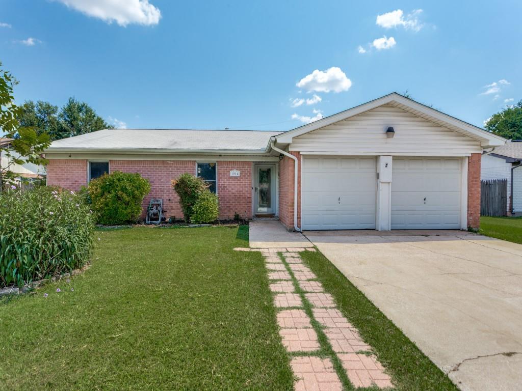 1216 Manning Street Benbrook, TX 76126 - Photo 3 of 26 Single story home with driveway, an attached garage, a front yard, and brick siding