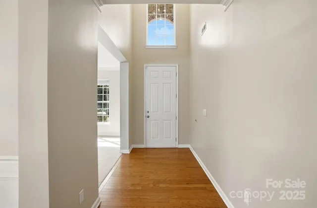 a view of hallway with windows