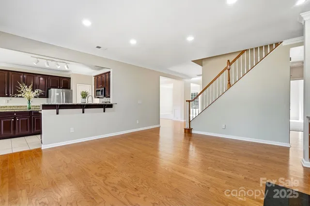 a view interior of a kitchen and kitchen with stainless steel appliances