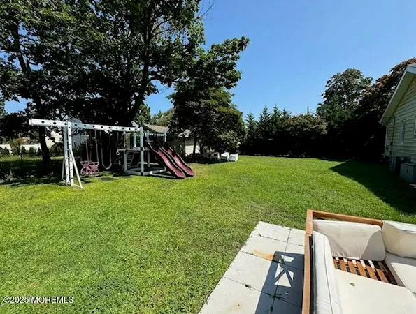 a view of a garden with a slide