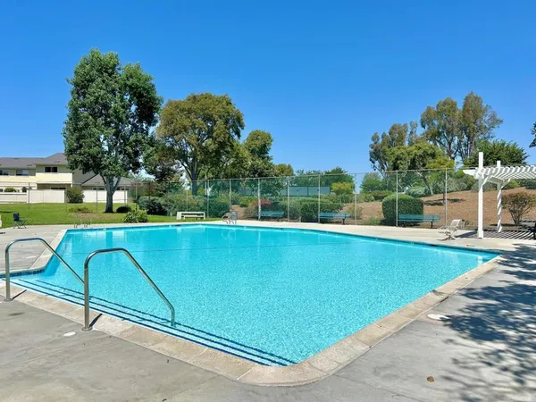 a view of a swimming pool and outdoor space