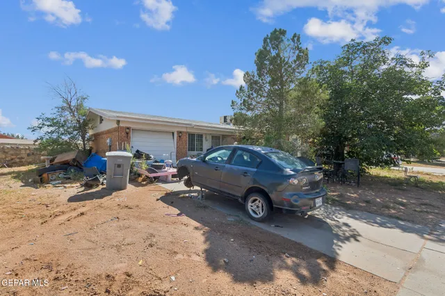 a car parked in front of a house