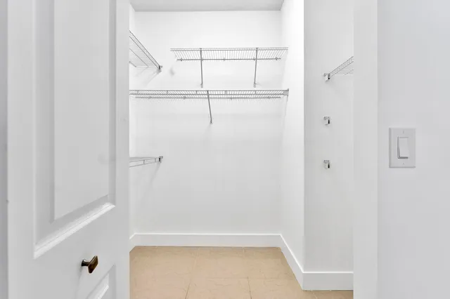 a bathroom with a double vanity sink and a bathtub