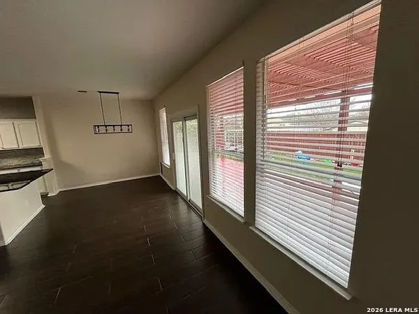 a bathroom with a shower and a toilet