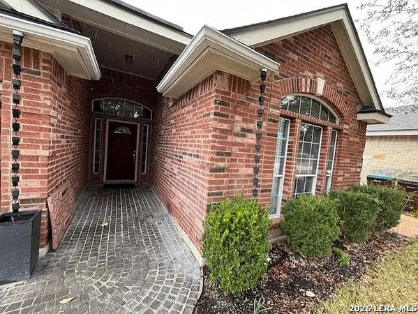 a view of a pathway with a house