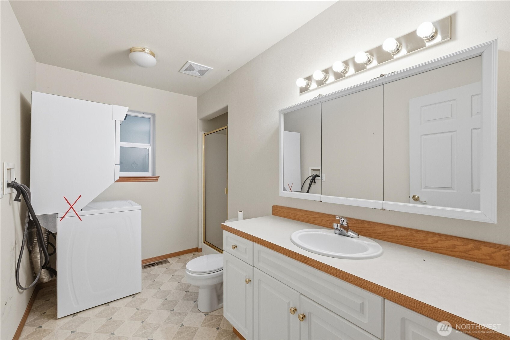 36 Holly View Way Bellingham, WA 98229 - Photo 25 of 40 a bathroom with a sink a toilet and mirror