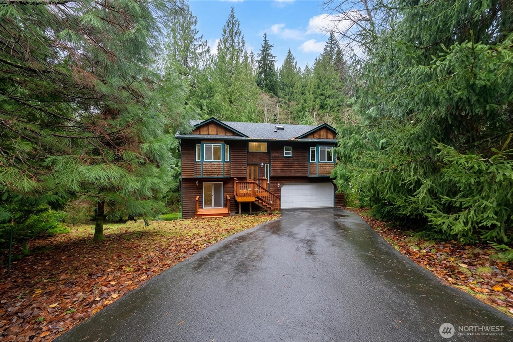 36 Holly View Way Bellingham, WA 98229 - Photo 35 of 40 a view of a house with a small yard and large trees