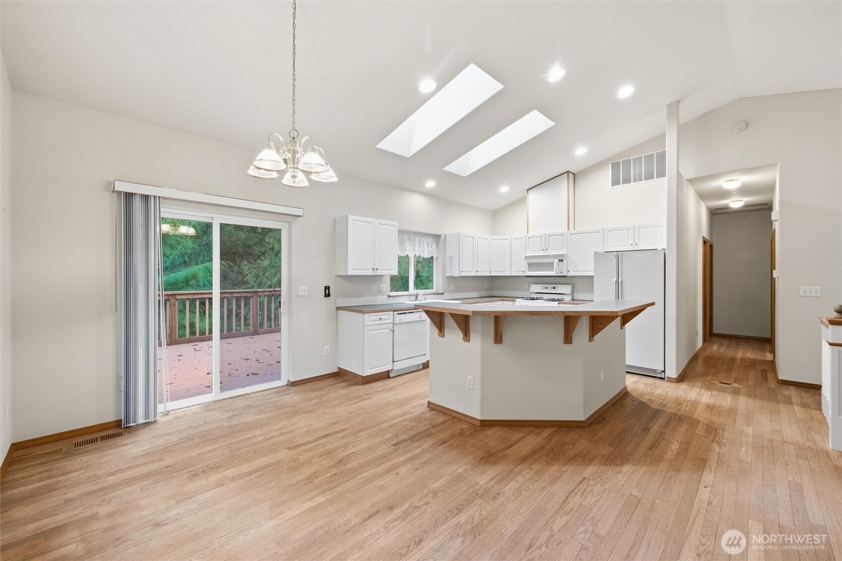 36 Holly View Way Bellingham, WA 98229 - Photo 6 of 40 a living room with stainless steel appliances kitchen island granite countertop a living room view and a large window