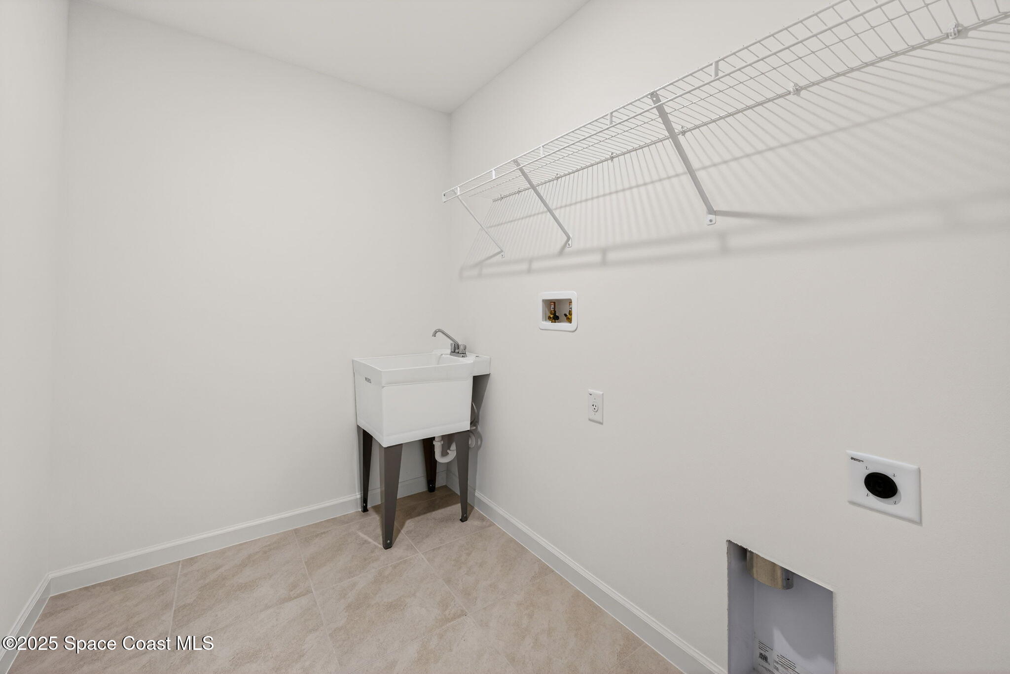 474 Scenic Road Palm Bay, FL 32908 - Photo 25 of 45 Large Inside Laundry