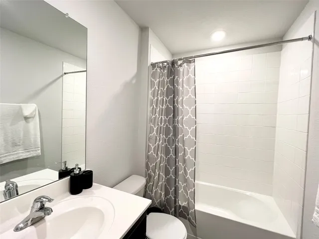 an empty room with a wooden floor