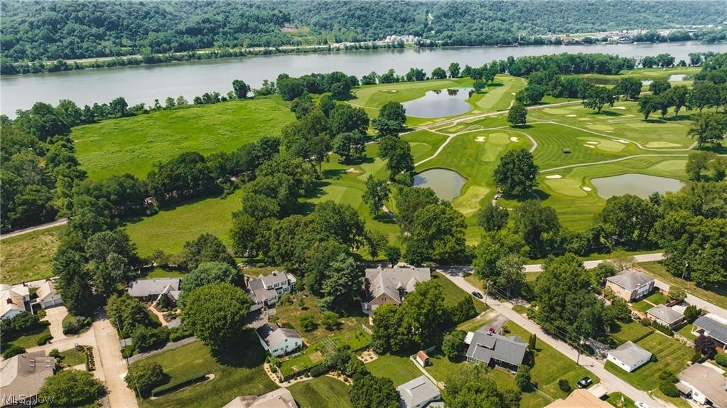 3908 River Road Vienna, WV 26105 - Photo 9 of 48 Aerial view shows the golf course views from the house, and the Ohio River beyond