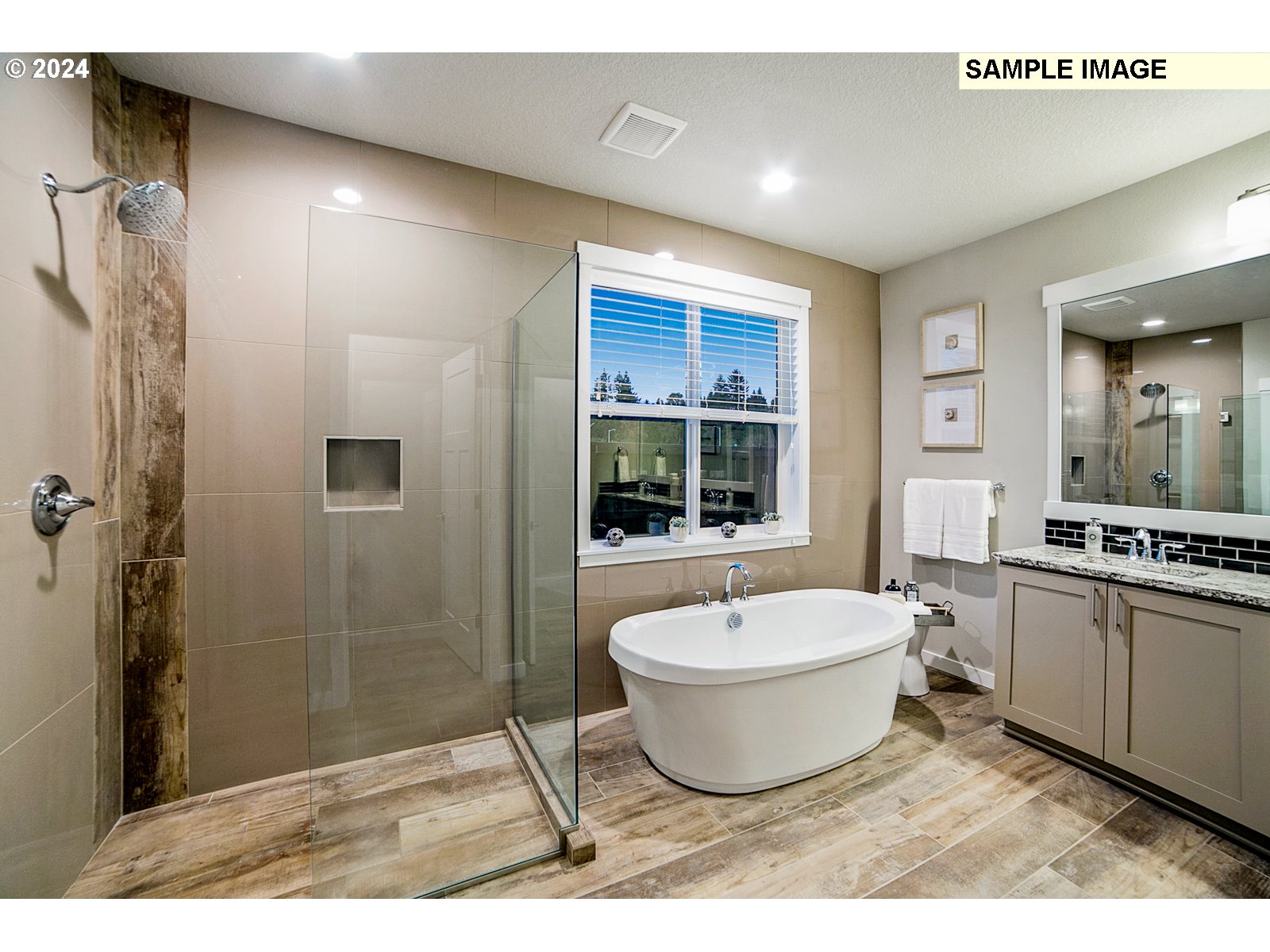 1309 North Kalani Loop, Unit LOT 54 Ridgefield, WA 98642 - Photo 14 of 24 a spacious bathroom with a bathtub and shower