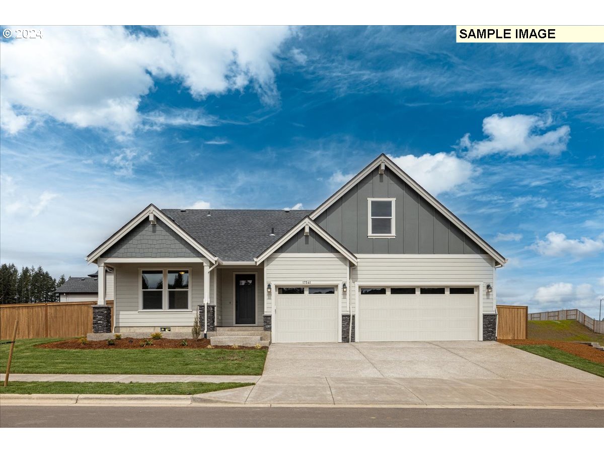 1309 North Kalani Loop, Unit LOT 54 Ridgefield, WA 98642 - Photo 3 of 24 a view of house and outdoor space with yard