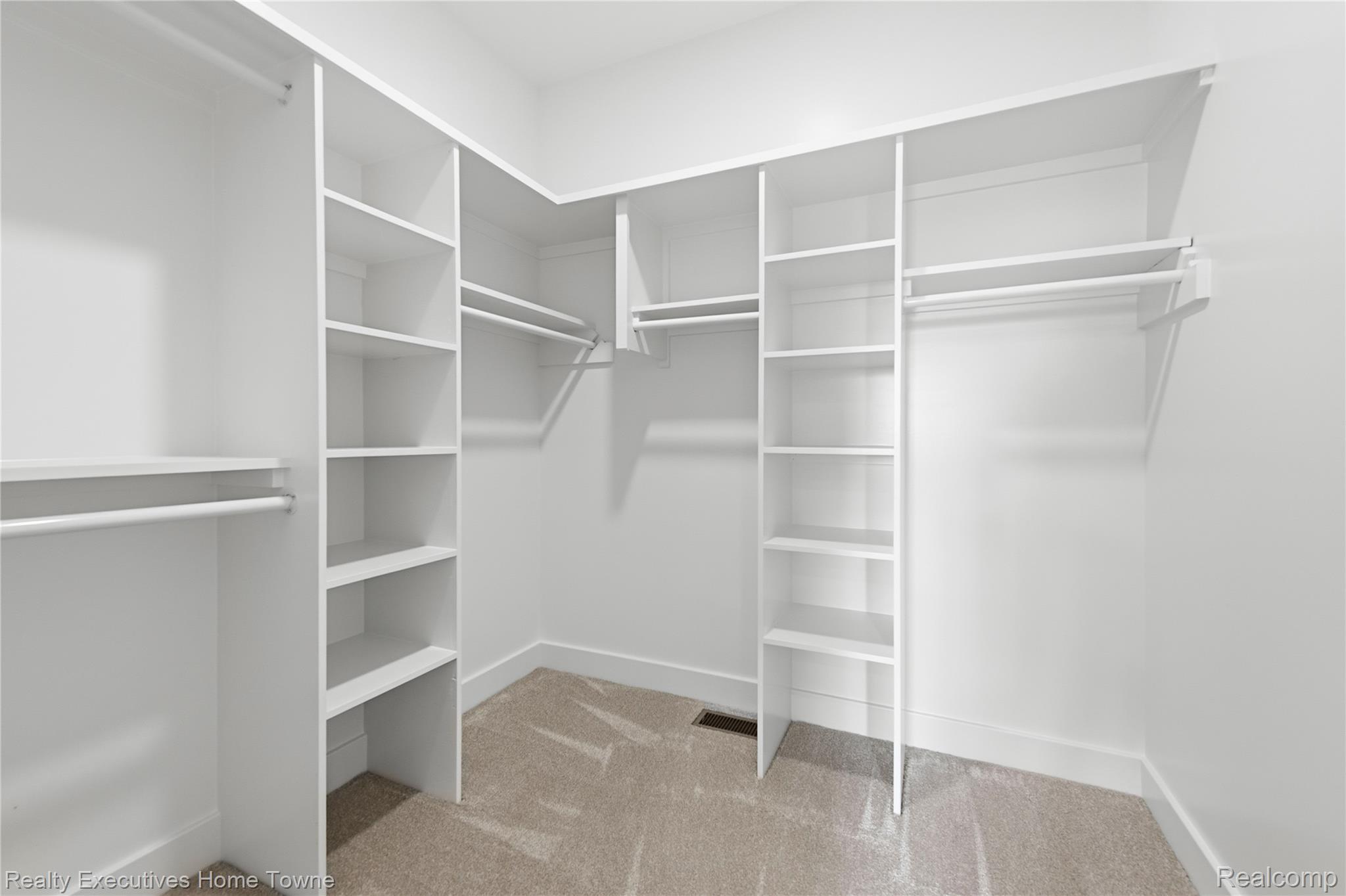 26850 Irwin Road Richmond, MI 48062 - Photo 14 of 47 Walk in closet featuring light carpet