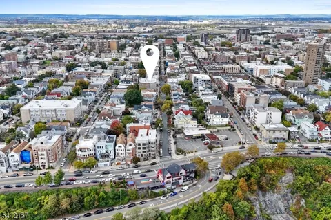 an aerial view of a city with lots of residential buildings