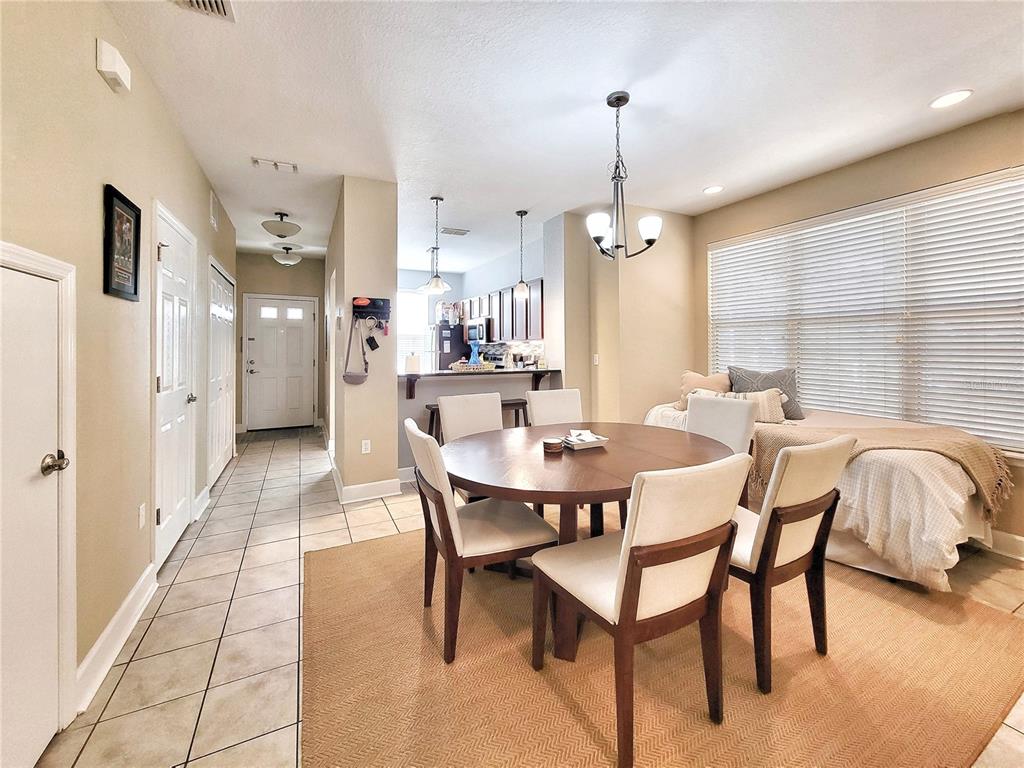 2508 Southwest 35th Place, Unit P91 Gainesville, FL 32608 - Photo 13 of 33 a dining room with furniture and window