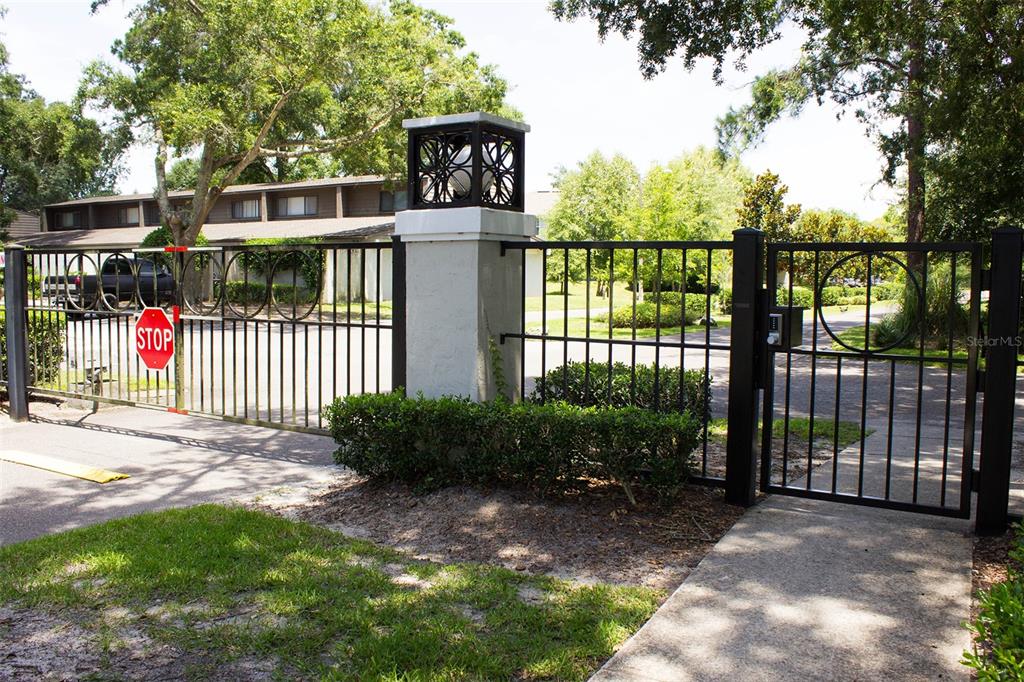 2508 Southwest 35th Place, Unit P91 Gainesville, FL 32608 - Photo 33 of 33 a view of a park with a large trees next to a yard