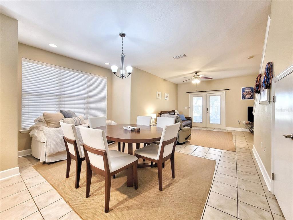 2508 Southwest 35th Place, Unit P91 Gainesville, FL 32608 - Photo 5 of 33 a view of a dining room with furniture