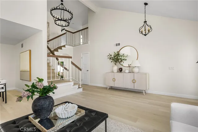 a kitchen with a sink a counter and cabinets
