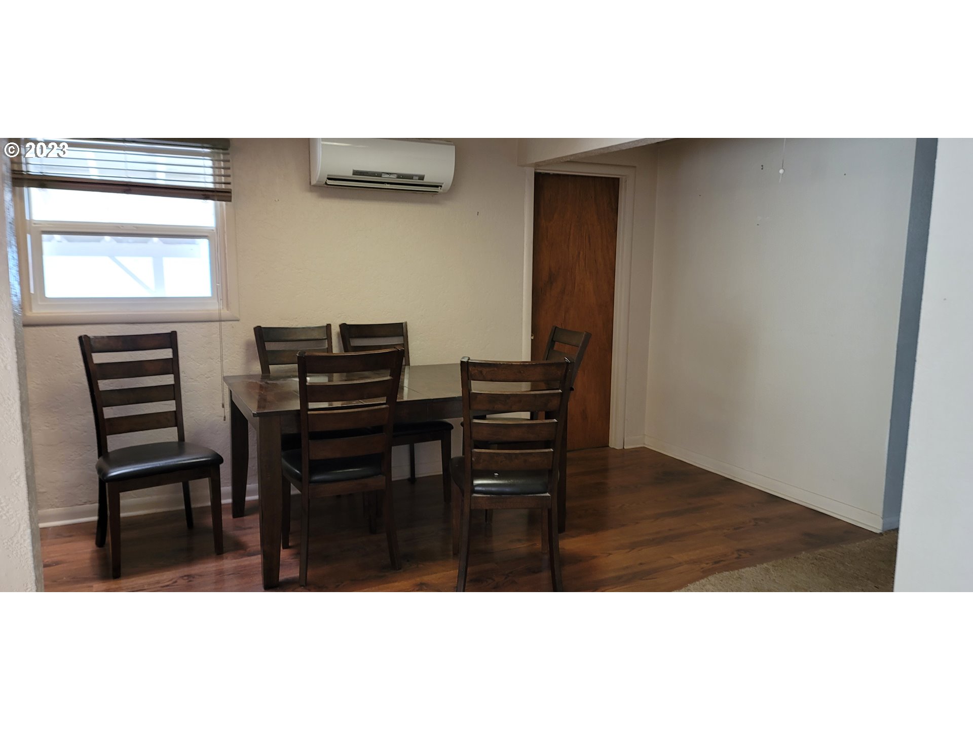 1106 J Street Springfield, OR 97477 - Photo 4 of 17 a kitchen with a table and chairs