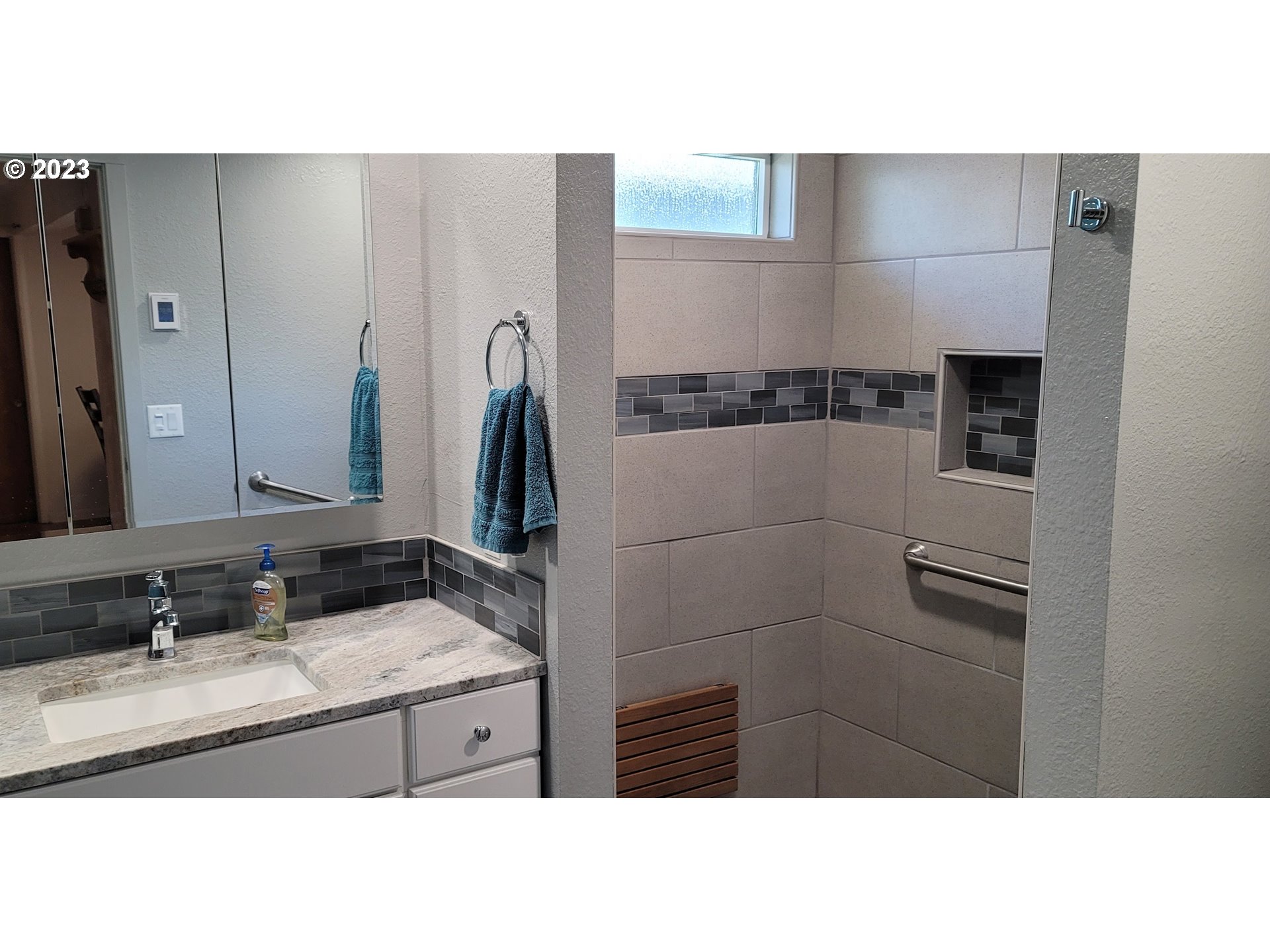 1106 J Street Springfield, OR 97477 - Photo 7 of 17 a bathroom with a sink and a mirror